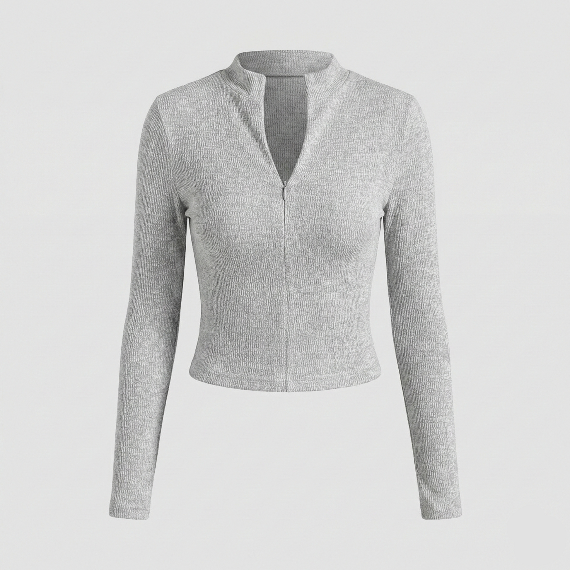 Textured knit top with a mock neckline and front zipper, featuring long sleeves and a form-fitting silhouette.