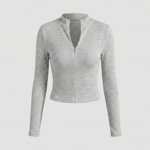 Textured knit top with a mock neckline and front zipper, featuring long sleeves and a form-fitting silhouette.